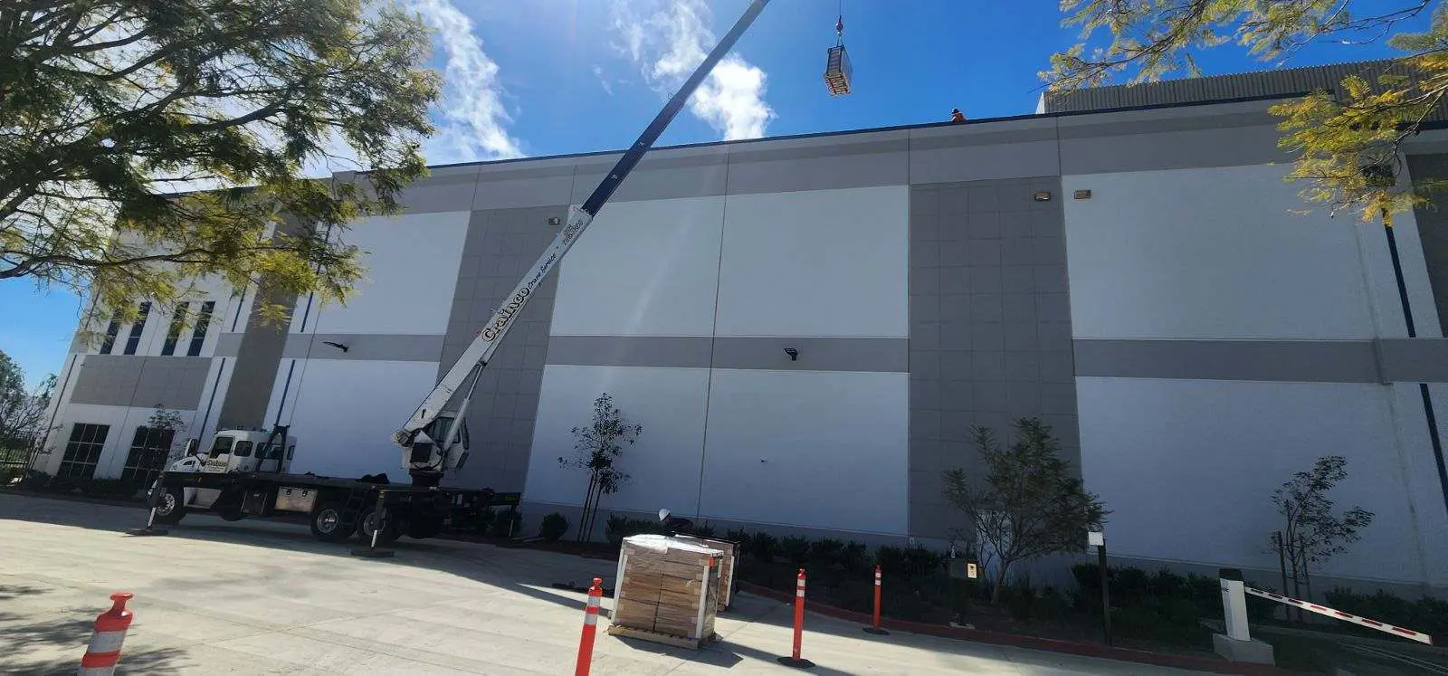 crane raising filters to roof